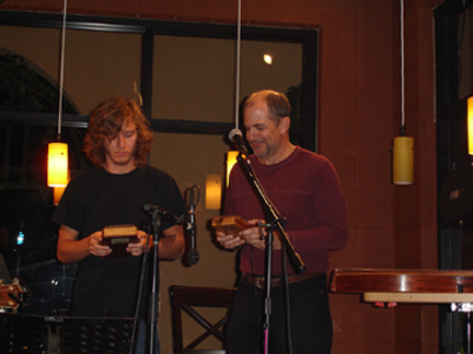 Andy Robinson with John Sprague playing the kalimba.